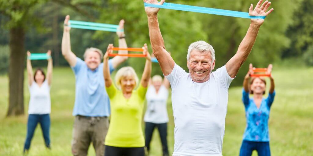 Frutolyn vitamin D cancer elderly exercising in park outdoors
